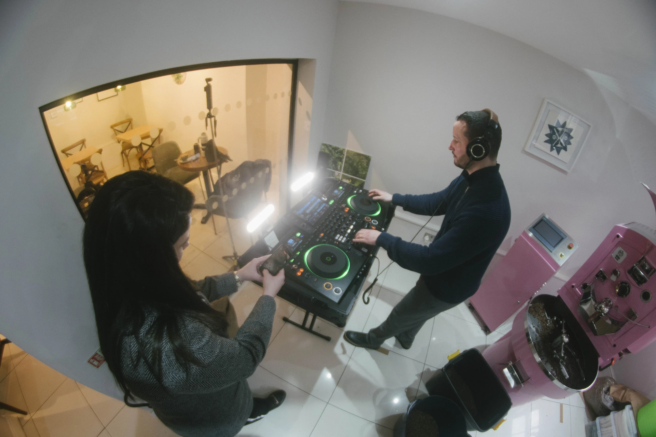 Behind-the-scenes view of Eden documenting a DJ performance