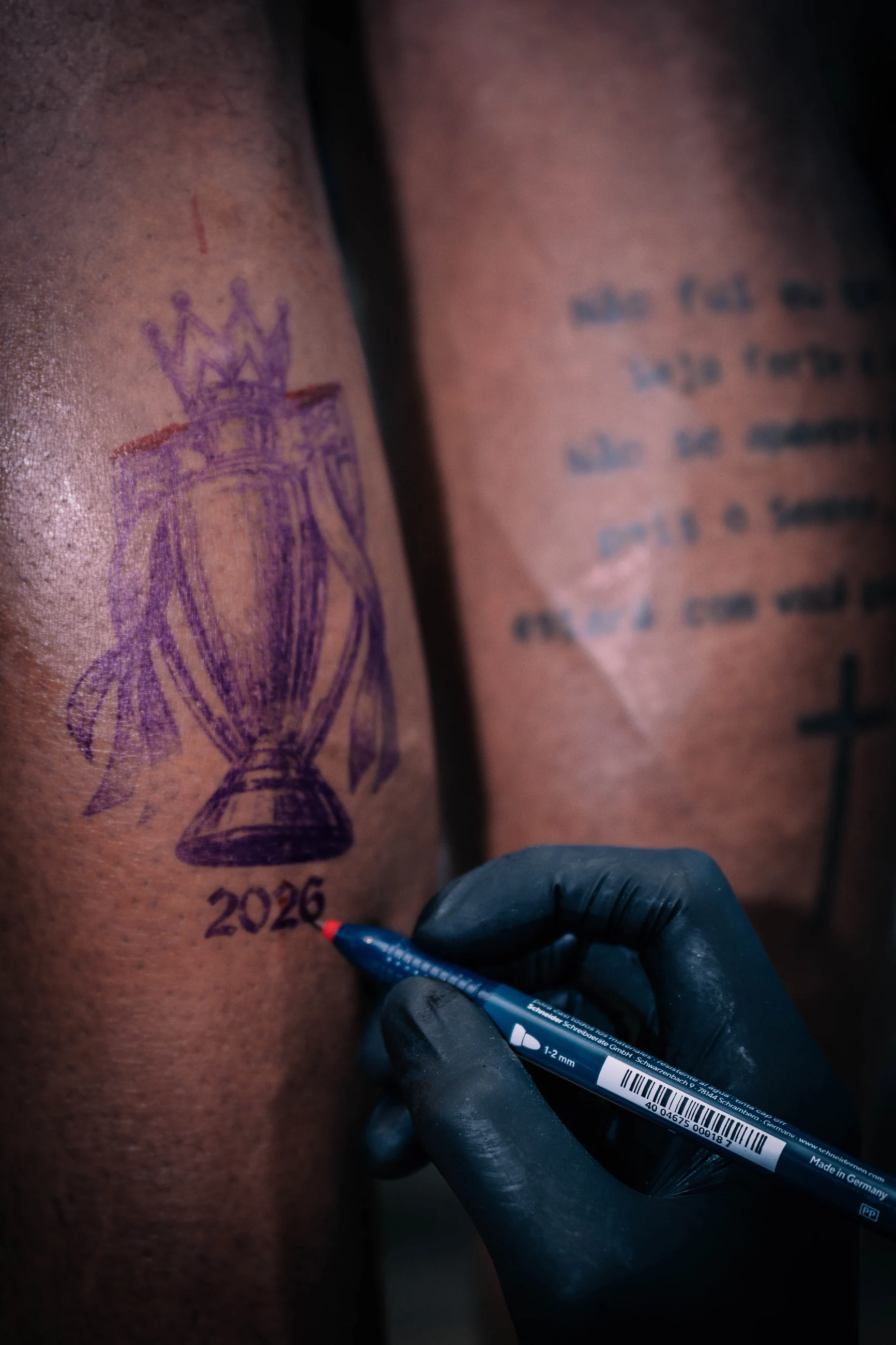 Premier League trophy design marked on Gabriel Magalhães' calf before tattooing
