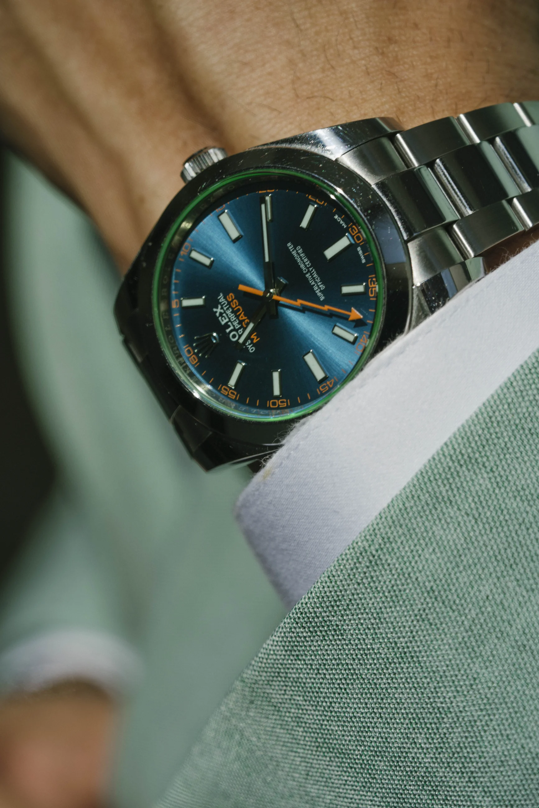 Watch, cuff and fabric detail from the Lapela Trajes story
